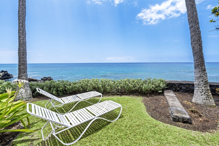 Lounge chairs just steps from the lanai invite you to relax with uninterrupted oceanfront views.