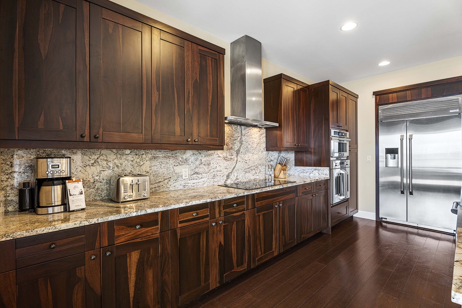 Spacious kitchen for many to join in for meal preparation