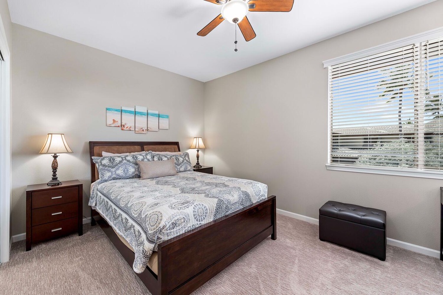 Upstairs Guest bedroom 2 has queen bed, AC and fan.