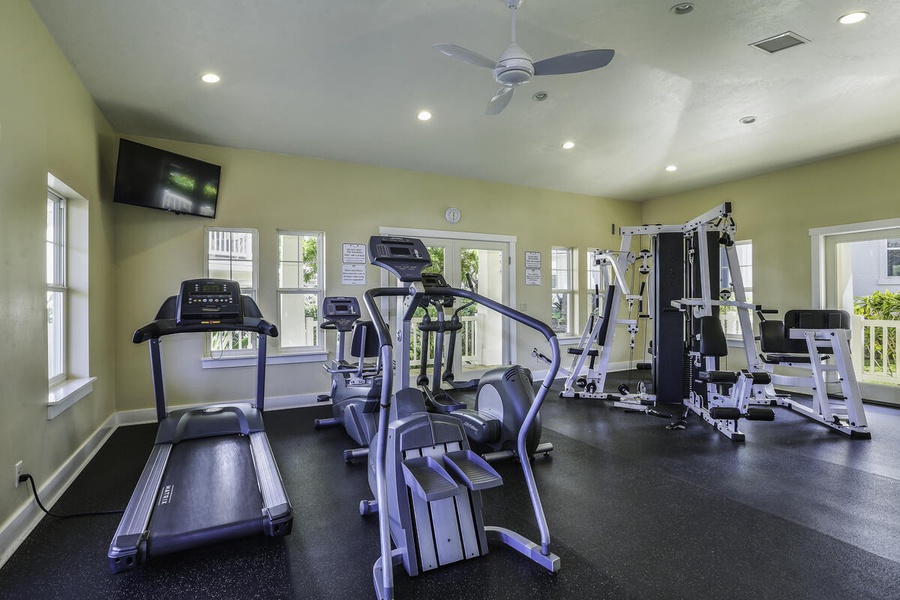 Gym with cardio and weight machines for a full-body workout.