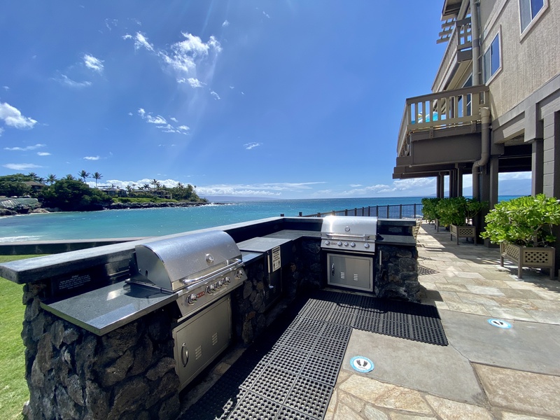 Grill your favorite meals at the shared outdoor BBQ area at Kahana Sunset Resort.