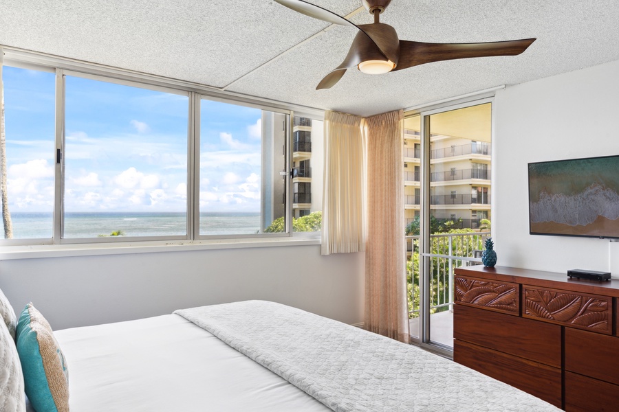 Royal Kahana 308’s bedroom offers direct access to the lanai—so you’re never far from a fresh breeze or morning coffee moment.