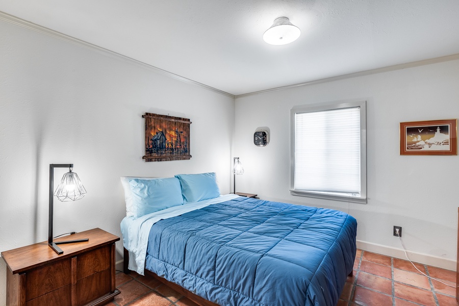Get a glance of the third bedroom, offering restful comfort whether in the day or night.