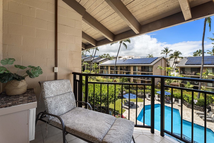 Unwind on our lanai, a peaceful retreat offering sweeping views of the shimmering pool.