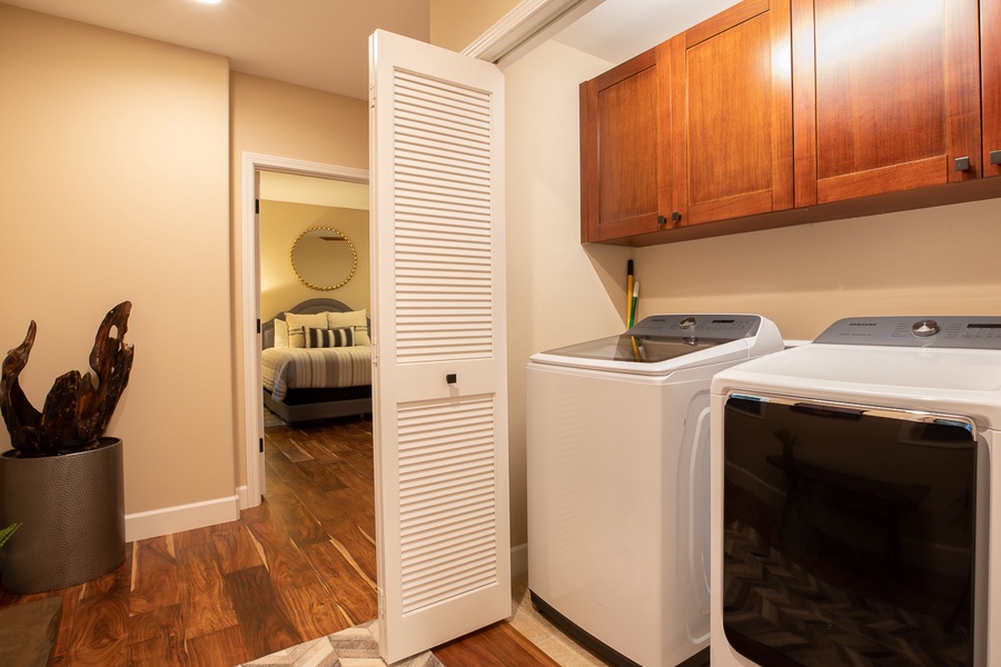 Laundry area with washer/dryer provided for a more convenient stay.