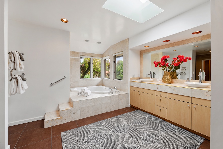 Spacious Primary bathroom with heated towel holders.