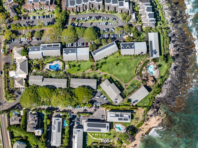 An aerial view of Napili Shores F-252 reveals both pools and its unbeatable location by the sea.