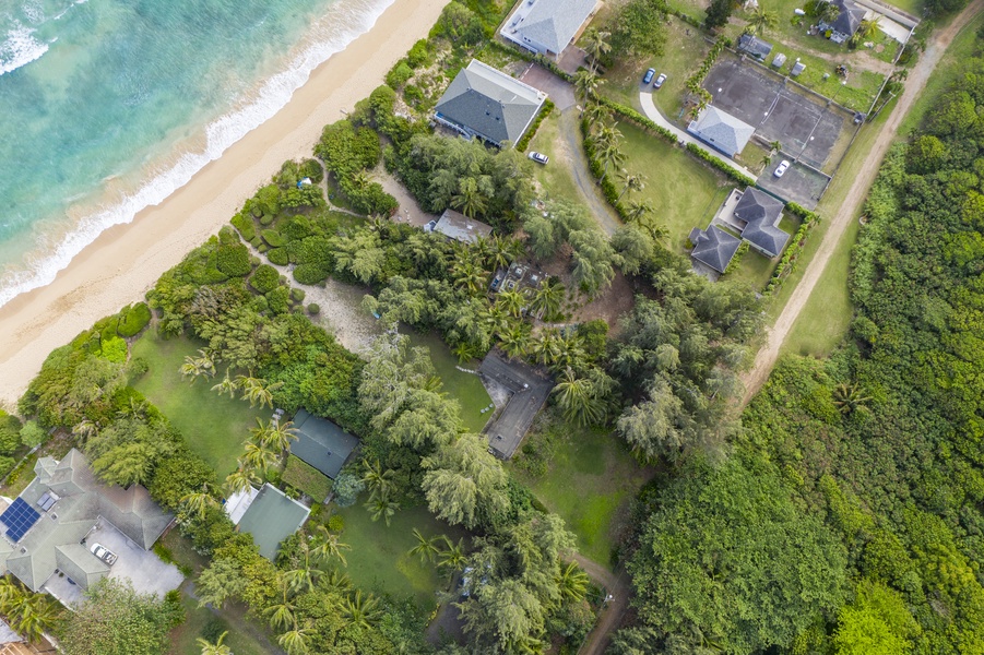 Only a few homes sit beachfront on this stretch of beach, known for its white sand and turquoise waters