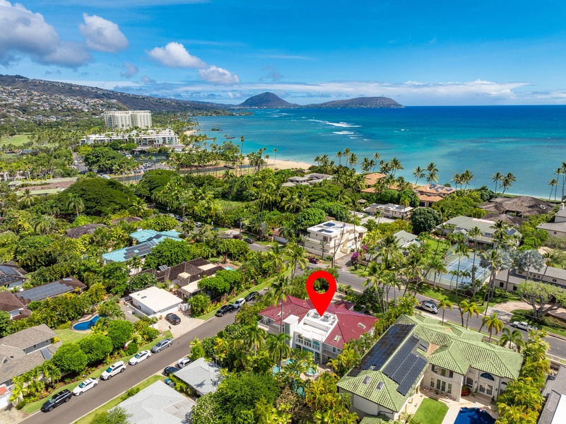 Aerial view highlighting the property’s prime location, just steps away from the beach and ocean.