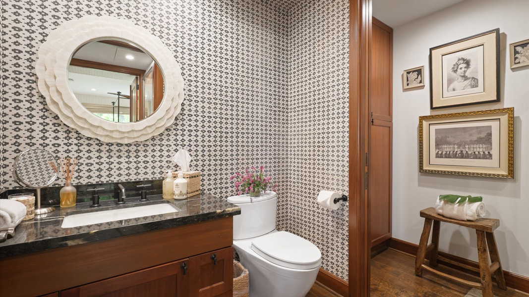The shared full bathroom with a single vanity and separate shower serves the upstairs bedrooms.