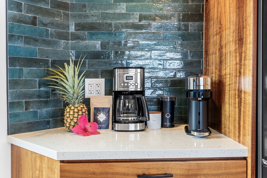 Morning ritual, elevated—fresh Kona coffee brewed steps from your lanai with custom tile and tropical detail.