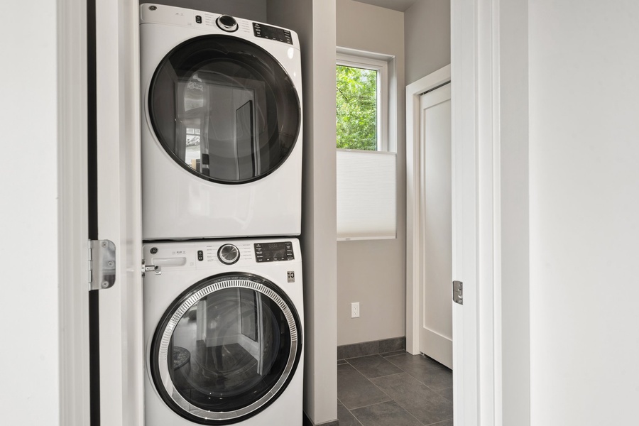 Full-size washer and dryer tucked near the entry for your mid-stay refresh.