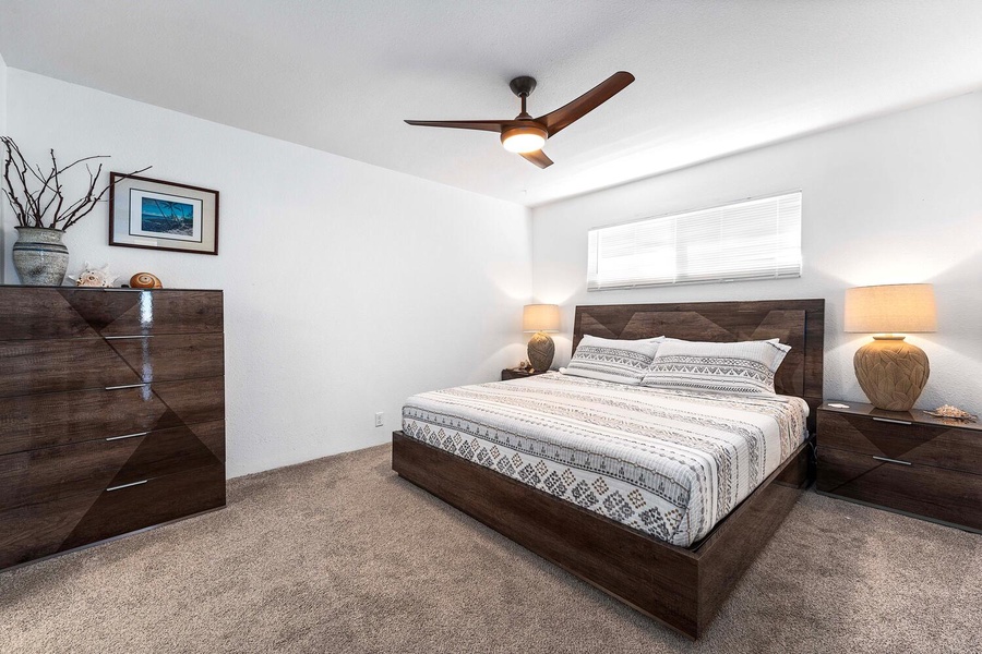 Downstairs Junior Primary bedroom has a king size bed, natural lighting and plenty of storage.