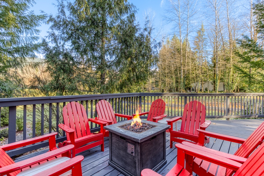 Gather your loved ones on our wrap-around deck, a perfect spot to enjoy a fire and amazing views.