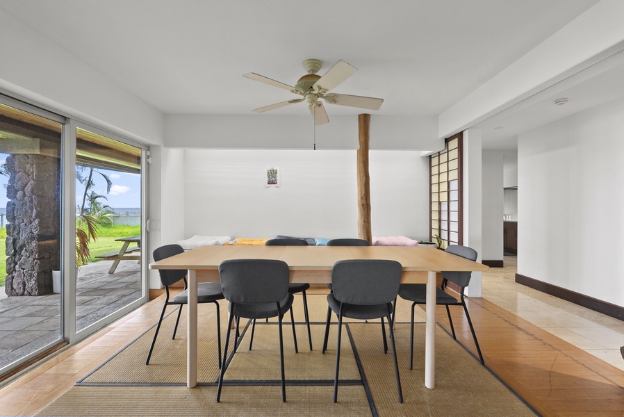 Casual dining nook with ceiling fan and direct access to the outdoors.