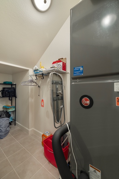 Your dedicated laundry space keeps your travel wardrobe fresh with modern appliances and convenient storage.