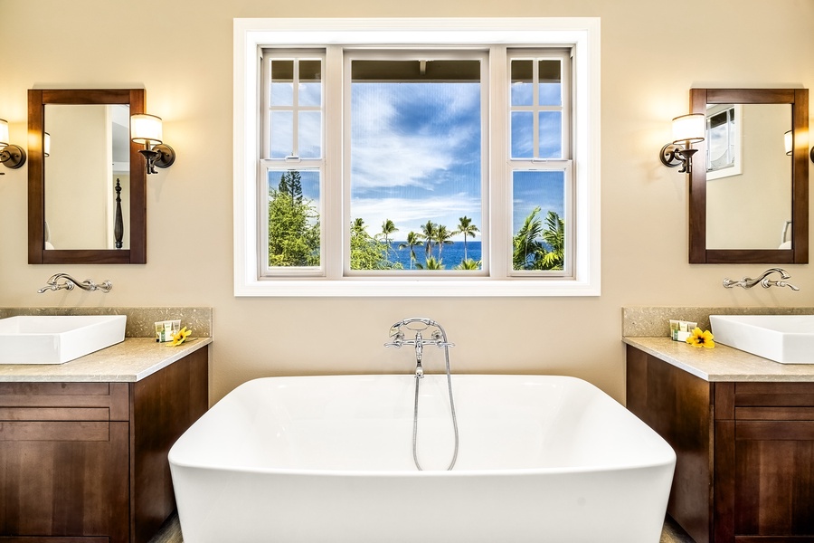 Enjoy a luxurious soak while gazing at tropical views.