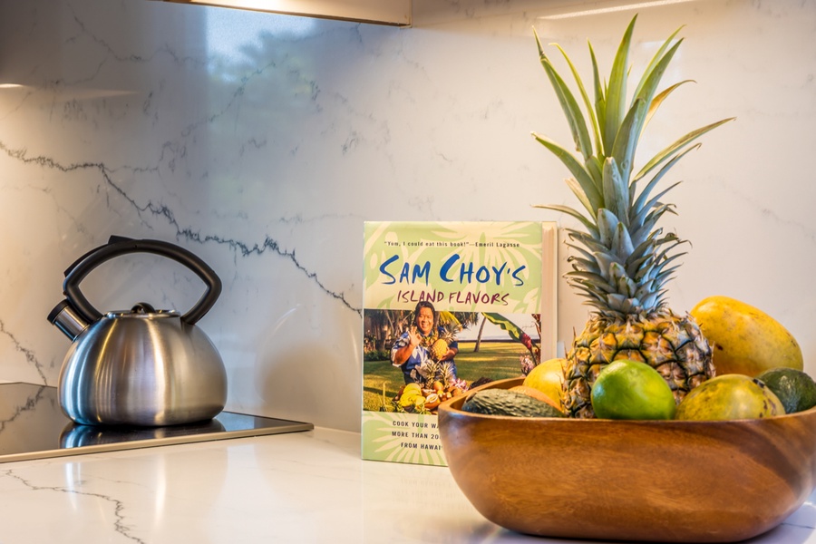 Your kitchen welcomes you with tropical touches—fresh pineapple and citrus await your island-inspired cooking adventures.