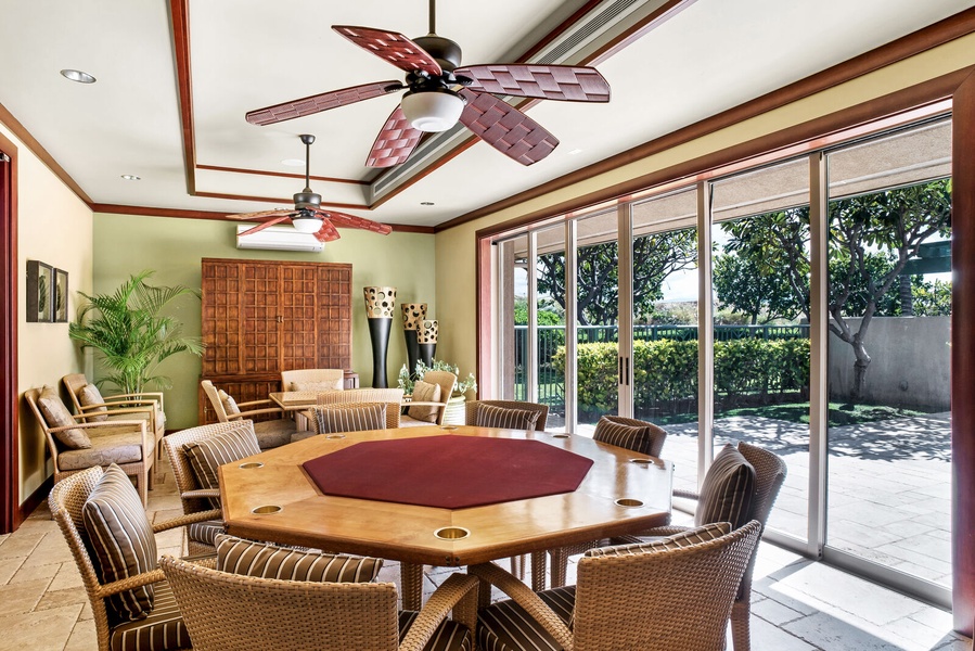 Challenge friends to a friendly round of cards or board games in this airy clubhouse space.