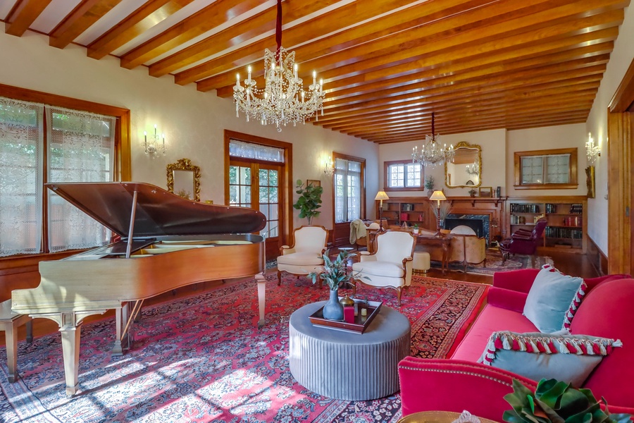 Elevate your stay by enjoying the timeless elegance of live music on the grand piano in this stunning formal living room.