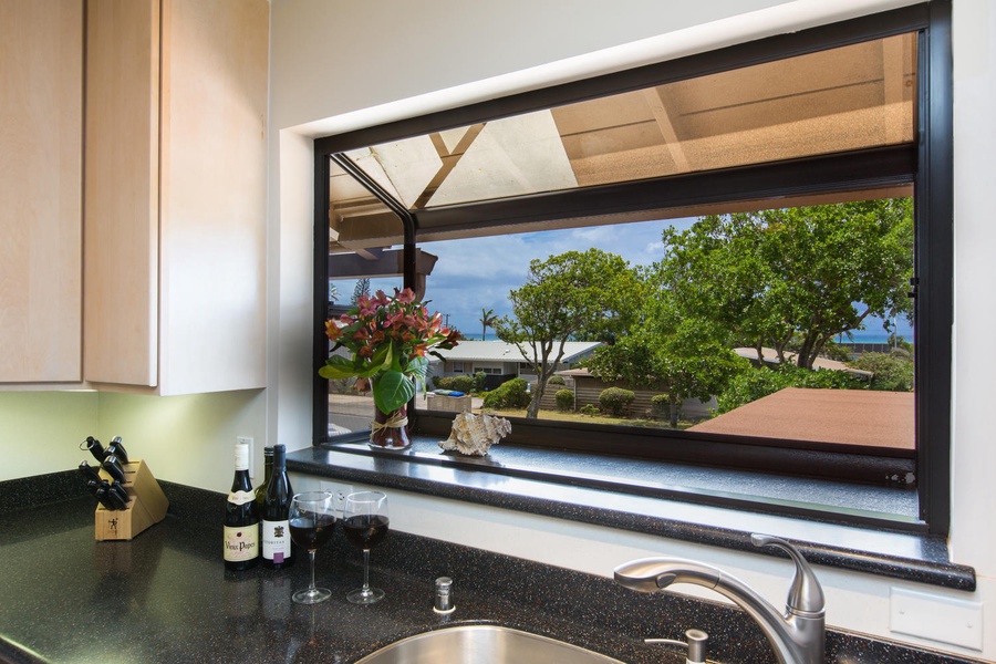 Washing dishes on vacation isn't a chore with this breathtaking ocean view!