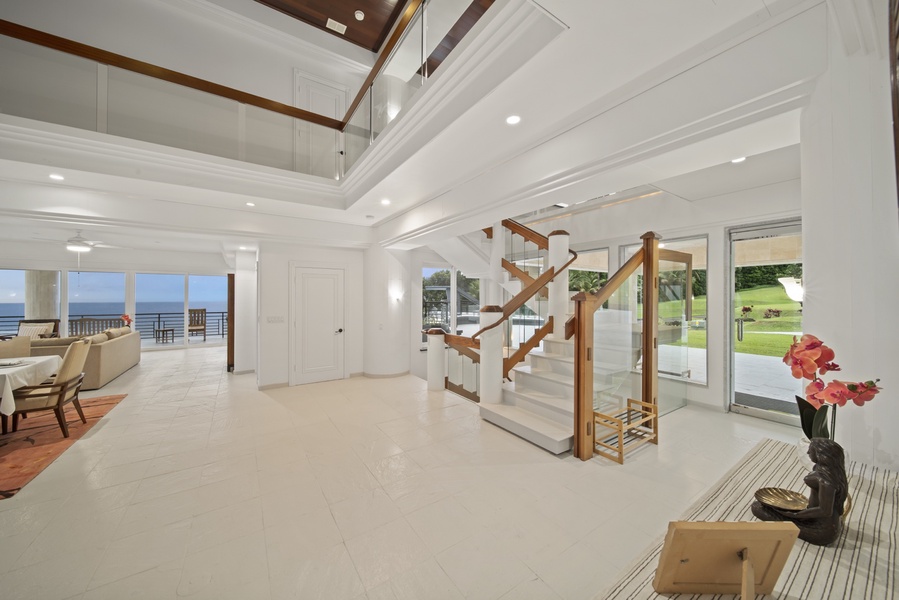 Wider view of front entrance showcasing ocean views.