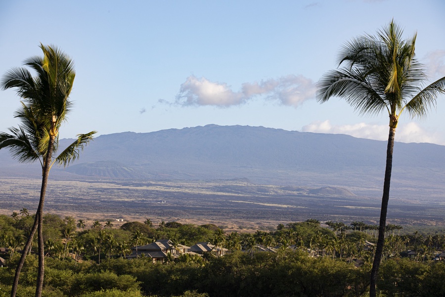 Enjoy expansive mountain views that add a majestic touch to your island mornings.