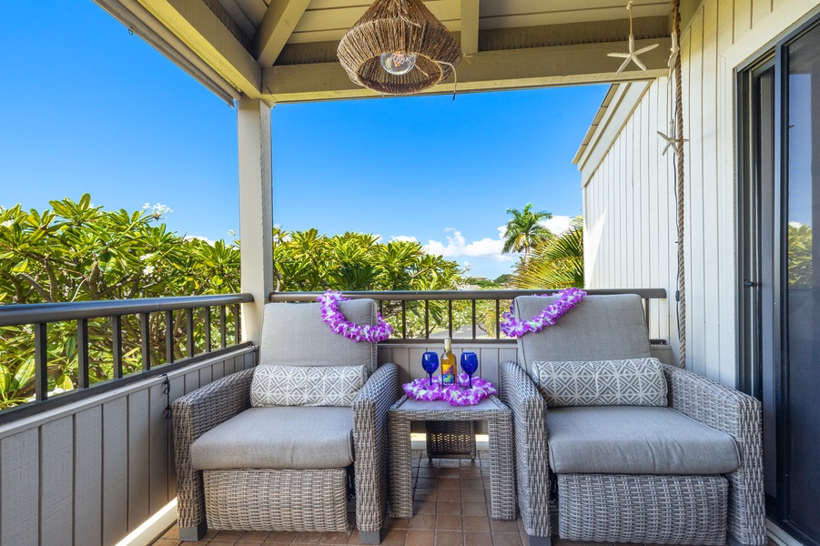 Relax on the cozy lanai seating and enjoy the tropical views and fresh air.