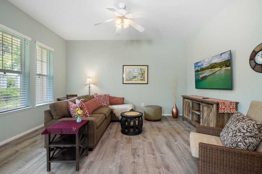 Spacious living room with plush seating, island-inspired decor—ideal for relaxing after Ko Olina beach days.