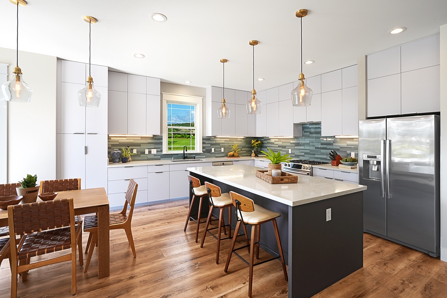 Modern kitchen with a spacious island, ideal for breakfast and quick snacks.