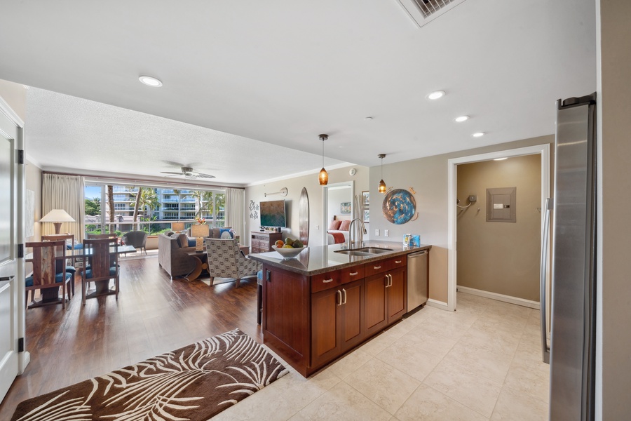 Enjoy effortless entertaining in the open layout of Honua Kai Konea 204, with the kitchen flowing into the dining area.