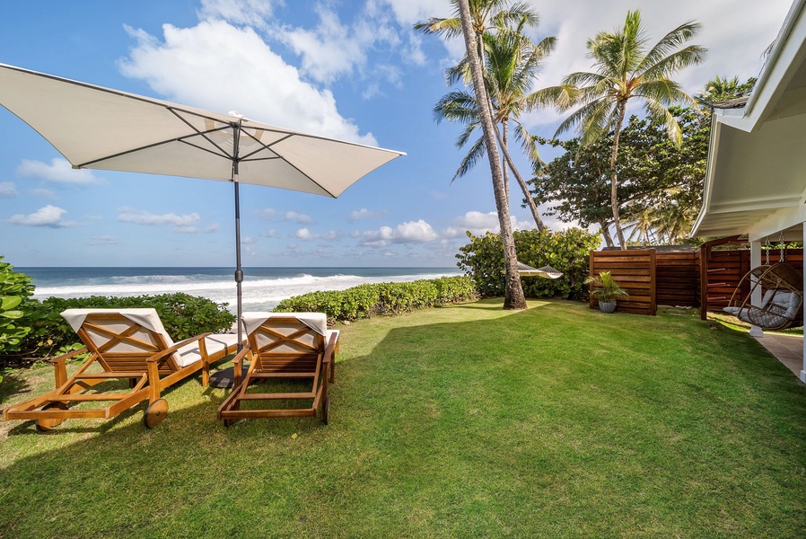 Your private backyard gently leads you to the beach, just a few steps away!
