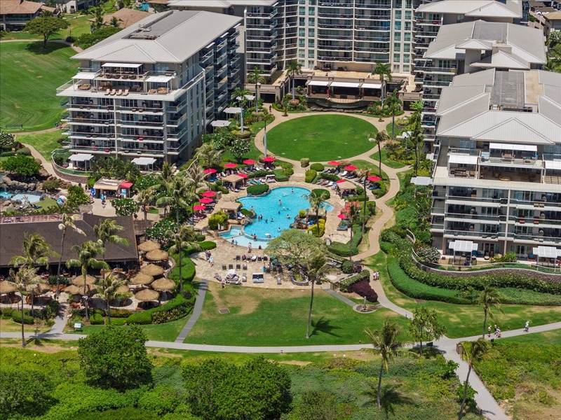 Bird’s-eye view of lush resort grounds and pools surrounding Honua Kai Konea 204.