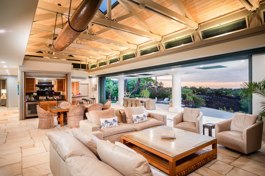 Expand your gathering space with this open‑concept kitchen, dining and living zone — designed for both comfort and connection.