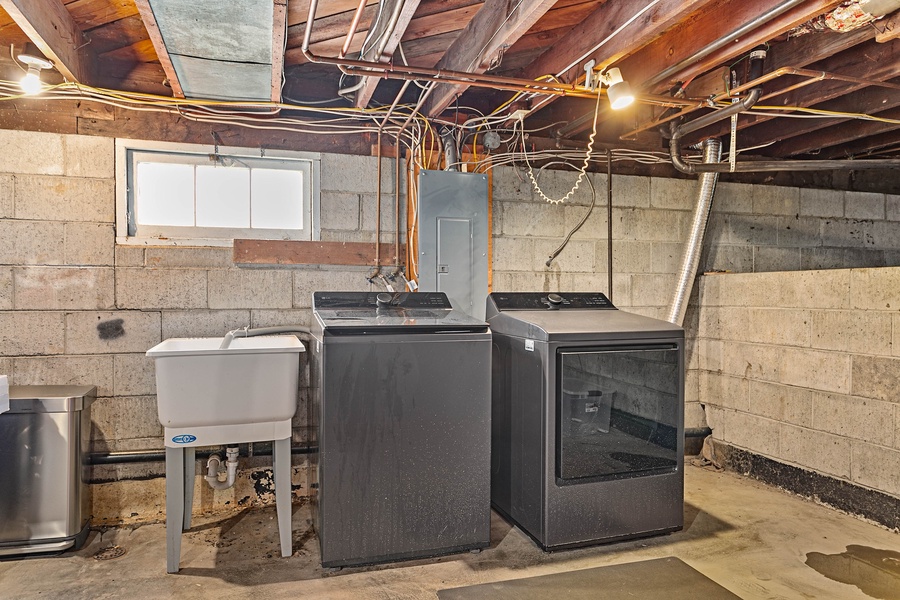 A clean and functional basement includes laundry and secure bike storage for post-Galbraith cleanup.