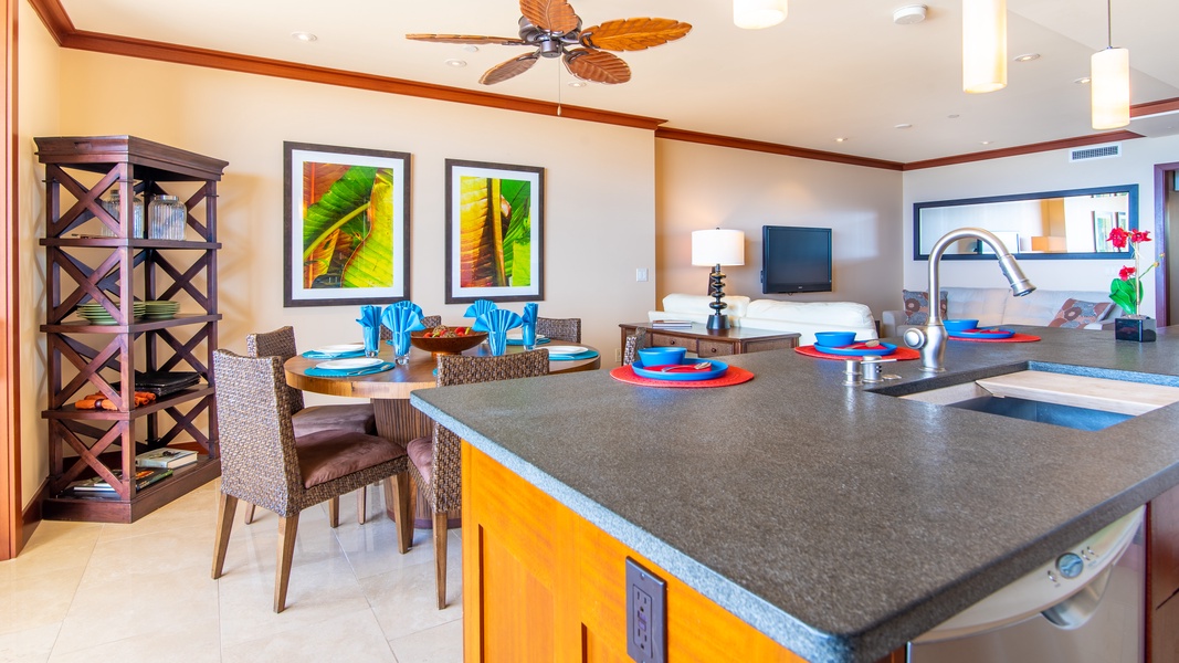 The dining and living area with vibrant art throughout.