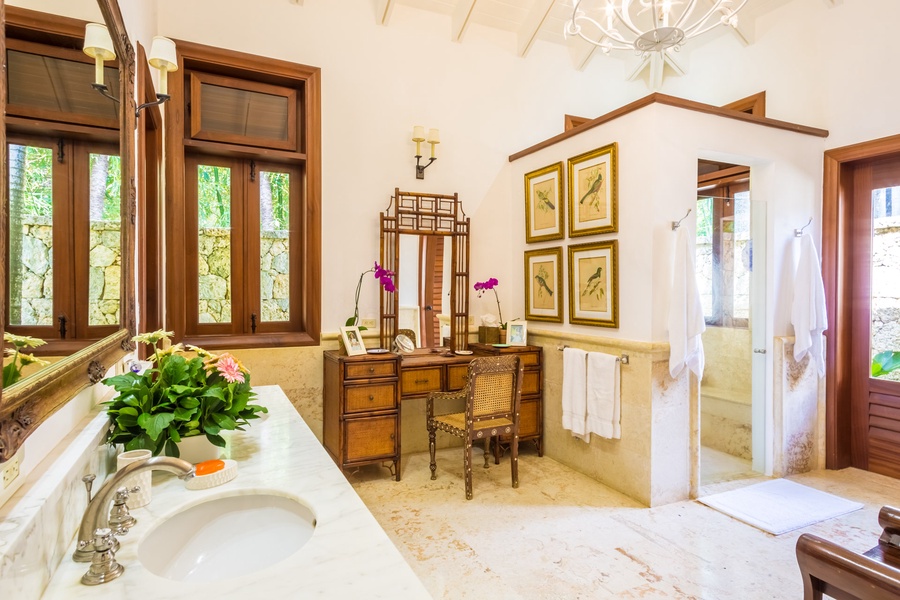 The ensuite bathroom has two vanity spaces and a separate walk-in shower.