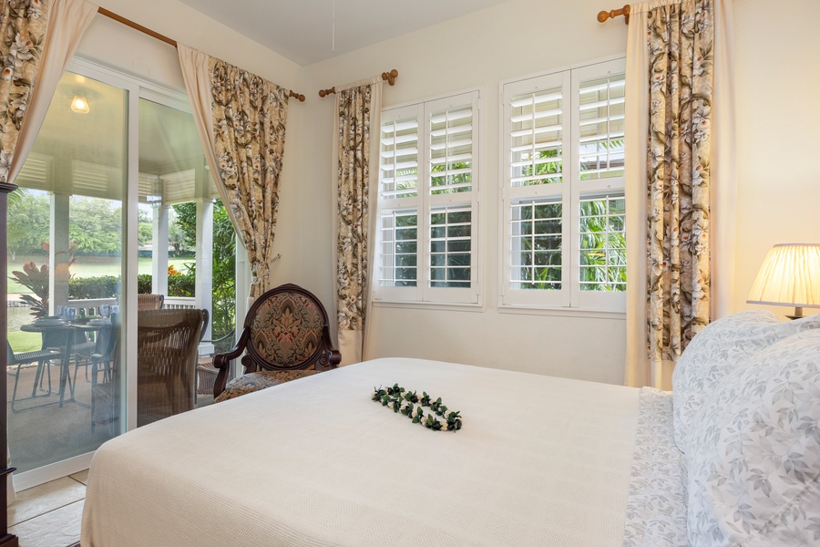 Your bedroom retreat with garden views, where elegant florals and soft lighting create the perfect sanctuary for restful nights.