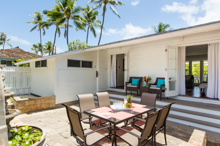 Dine and relax in the spacious outdoor entertaining area, complete with seating and a large backyard.