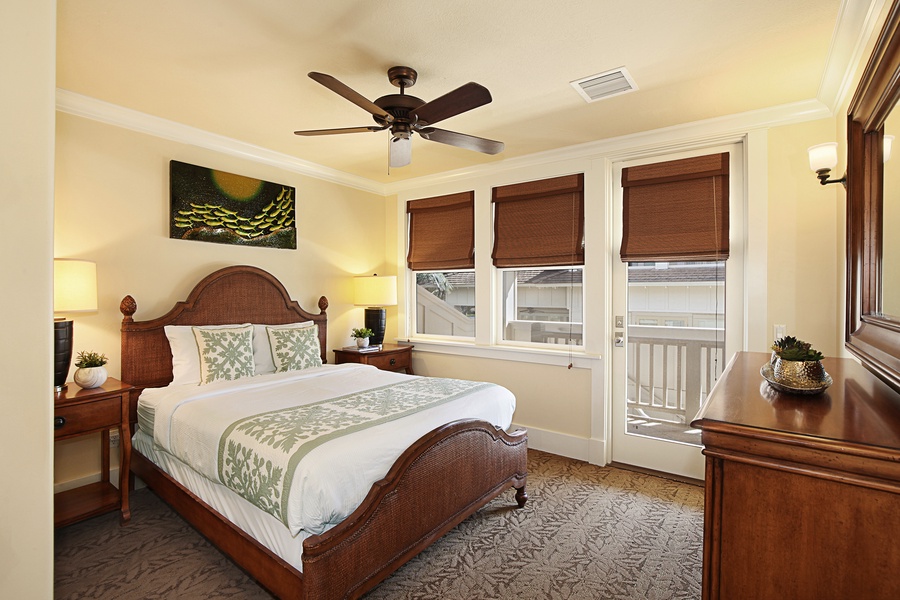 Primary bedroom with a king bed and private lanai.