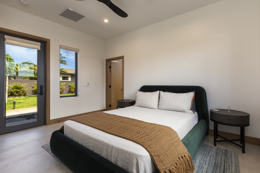 This additional guest room is located under the same roof as the detached fifth guest bedroom