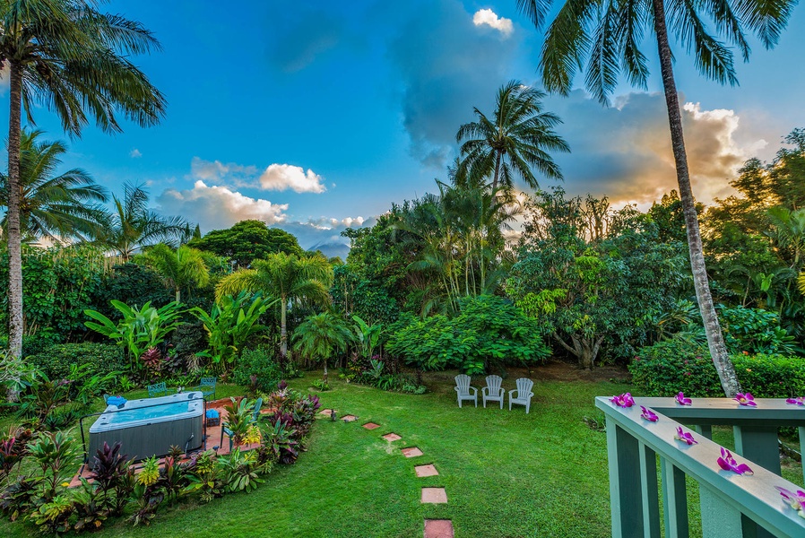 View from the back lanai... mountains and garden at sunset.