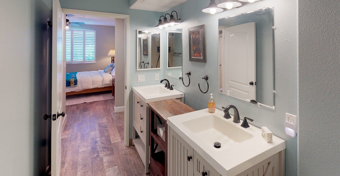 The primary guest bathroom with a stylish double vanity.