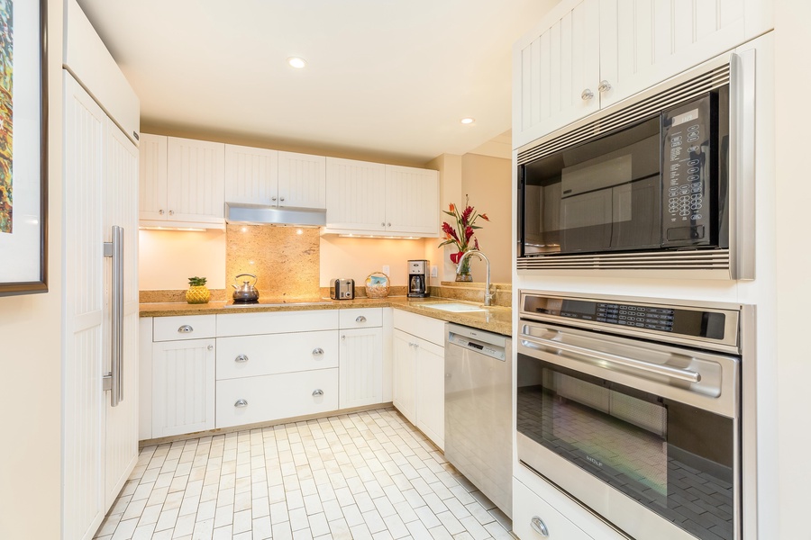 Large kitchen with stainless steel appliances