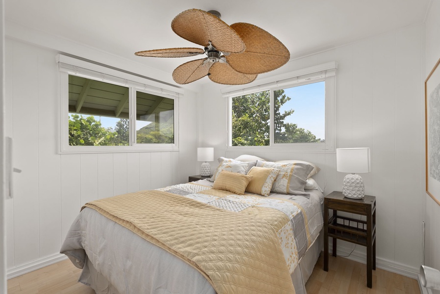 Drift off to sleep beneath the gentle whir of your tropical ceiling fan, while lush greenery frames your window views.