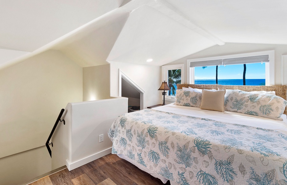 Bask in the comfort of this bright and spacious bedroom with vaulted ceilings.