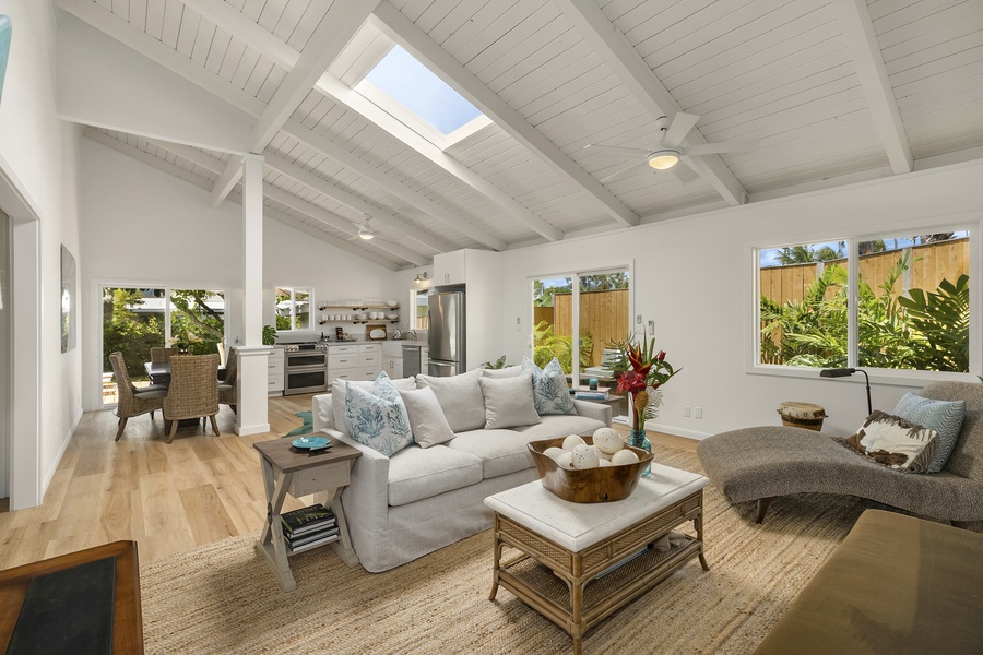 Open floor plan with Vaulted Ceilings and Skylight