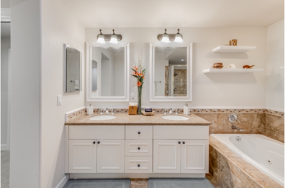 Primary Bedroom ensuite bathroom with dual-sink vanity and large jetted bathtub