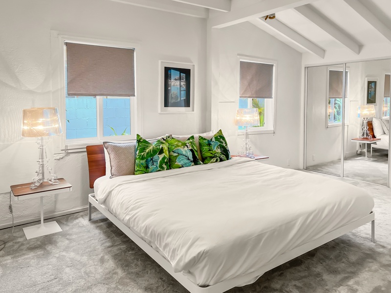 Relax in this bright and airy suite on a plush king bed.