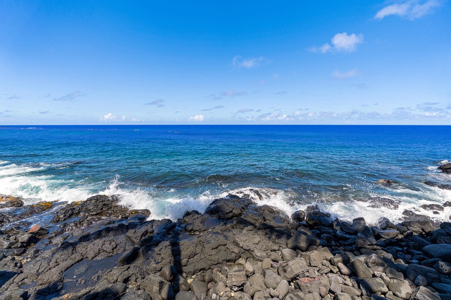 Gaze out at the endless Pacific under clear Hawaiian skies.